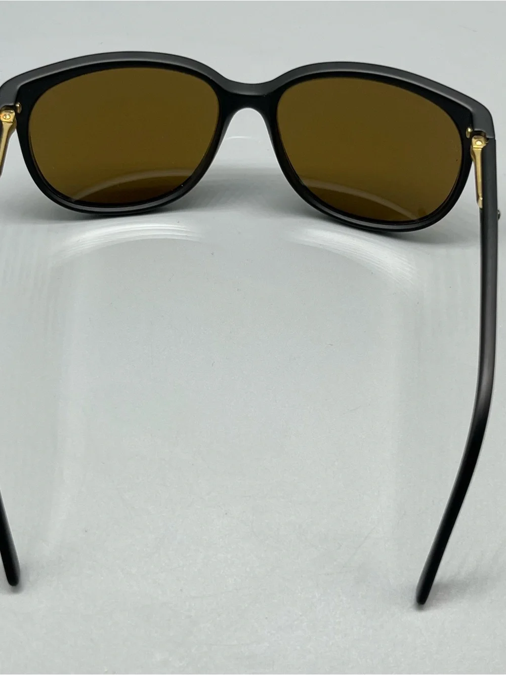 Revo Matte Black Sunglasses with Purple Mirrored Lenses